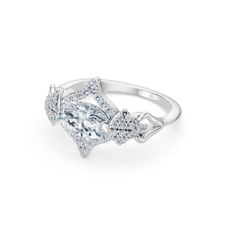 Colette ring in white gold, profile view showing the low east-west setting