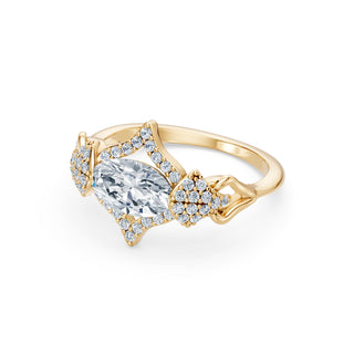 Colette ring in yellow gold, profile view showing the low east-west setting
