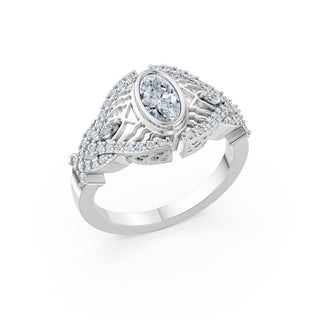 Corinne ring in white gold, angled view showing the marquise shoulder accents