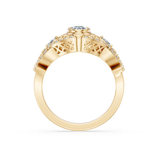 Corinne engagement ring in 14K yellow gold with an oval lab-grown diamond above a filigree gallery