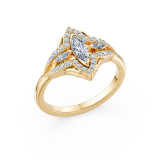Estelle ring in yellow gold, angled view showing the marquise side stones