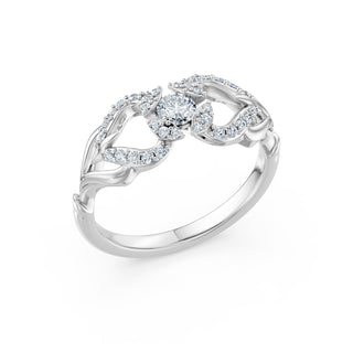 Laurel ring in white gold, angled view showing the pavé-outlined leaves