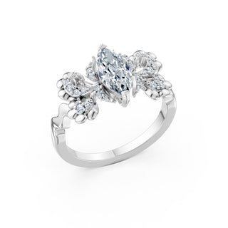 Primrose ring in white gold, angled view showing the floral clusters