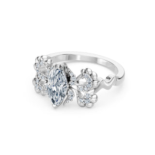 Primrose ring in white gold, profile view showing the sculpted petals