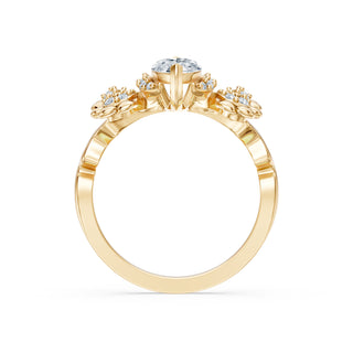 Primrose engagement ring in 14K yellow gold with a marquise lab-grown diamond among sculpted floral clusters