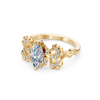 Primrose ring in yellow gold, profile view showing the sculpted petals