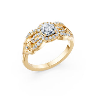Seraphine ring in yellow gold, angled view showing the scrolling halo